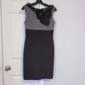 Dress with floral shoulder detail